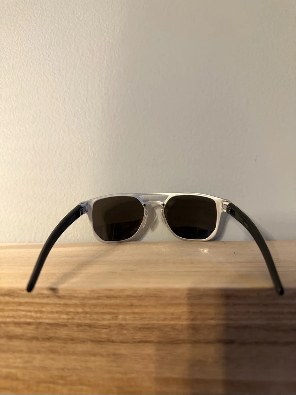 Oakley Latch Alpha Silver Framed Sunglasses with Dark Lenses
